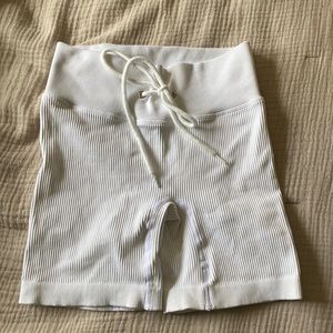 JET LAGGED white biker shorts